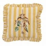 Coussin jaune brodé à fleur